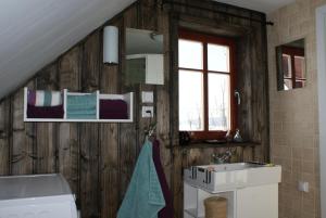 Ένα μπάνιο στο Guest House K74