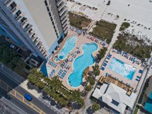 an overhead view of the pool at a resort at Majestic Beach Resort Tower 2 by Panhandle Getaways in Panama City Beach