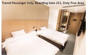 Terminal 2 Transit Hotel Incheon Airport房間的床