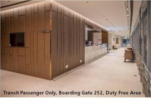 a hallway with lockers in a building at Terminal 2 Transit Hotel Incheon Airport in Incheon +11 photos