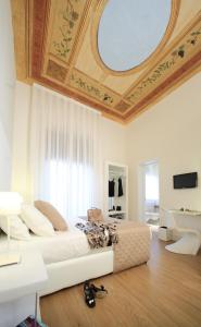 TV a/nebo společenská místnost v ubytování Al Castello Luxury B&B + 34 fotografií