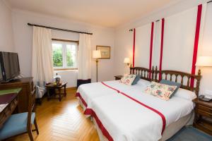 Cama o camas de una habitación en Parador de Ribadeo