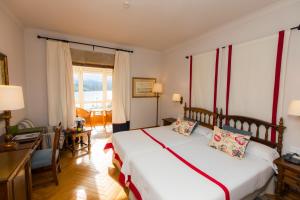 Cama o camas de una habitación en Parador de Ribadeo