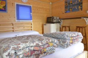 Voodi või voodid majutusasutuse Camping Adamello toas
