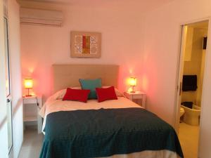 Ένα ή περισσότερα κρεβάτια σε δωμάτιο στο Complejo Solvang