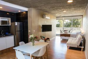 Η κουζίνα ή μικρή κουζίνα στο Qi Casas de Río