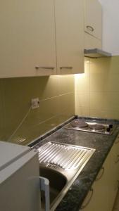 Kuchyň nebo kuchyňský kout v ubytování Apartments Šorić