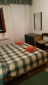 Postel nebo postele na pokoji v ubytování Apartments Šorić