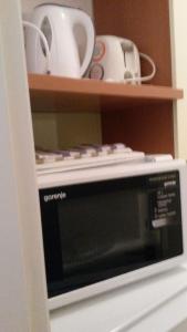Kuchyň nebo kuchyňský kout v ubytování Apartments Šorić