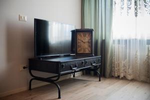 TV a/nebo společenská místnost v ubytování Locanda Jole Alloggio