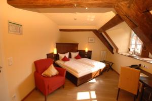 Postel nebo postele na pokoji v ubytování Hotel Restaurant Ölmühle