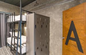 a room with a bunk bed and a door at Sanim Hostel in Ao Nang Beach +34 photos