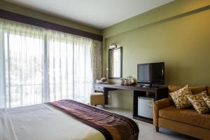 TV a/nebo společenská místnost v ubytování Poonyamantra Resort
