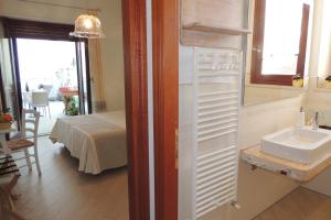 Postel nebo postele na pokoji v ubytování La Terrazza