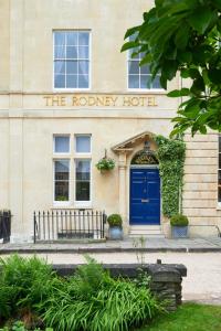 a building with a blue door on the rotary hotel at The Rodney Hotel in Bristol