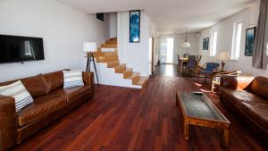 a living room with a couch and a table at Belado Residence Bol in Bol