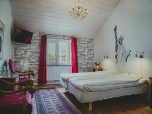 Postel nebo postele na pokoji v ubytování Lydinge Resort + 37 fotografií