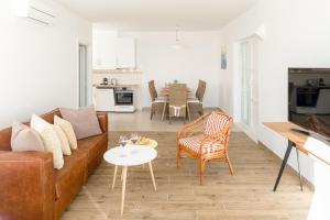 a living room with a couch and a table at Belado Residence Bol in Bol