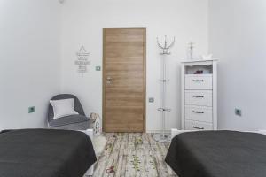 Postel nebo postele na pokoji v ubytování Apartment Paradise View