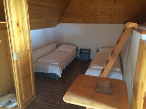 Postel nebo postele na pokoji v ubytování Vénusz Panzió és Vendéglő