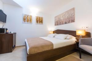 Posteľ alebo postele v izbe v ubytovaní Villa Four Winds II