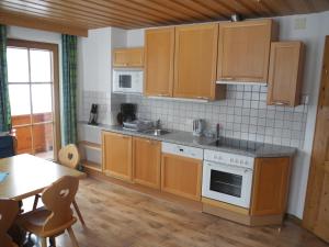Kuchyň nebo kuchyňský kout v ubytování Honsnhof + 27 fotografií