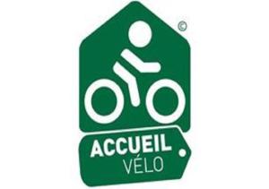 a green sign with a person riding a bike at Le Relais du Vivarais in Viviers