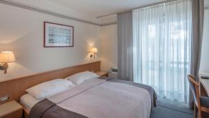 Postel nebo postele na pokoji v ubytování Diana B&B