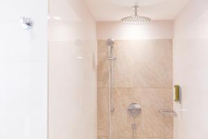 Ένα μπάνιο στο Hotel am Marktplatz - Landgasthof Wratschko - Gamlitz