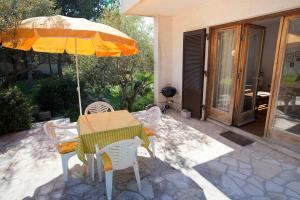Patio alebo iná vonkajšia časť ubytovania Gajic