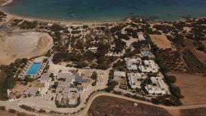 an aerial view of a resort next to the beach at Surfing Beach Village Paros in Santa Maria