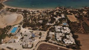 an aerial view of a resort next to the beach at Surfing Beach Village Paros in Santa Maria