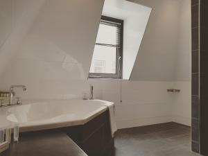 A bathroom at Apartment Vlissingen Aan Zee