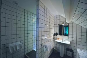 Koupelna v ubytování Logis - Hotel Restaurant La Mire