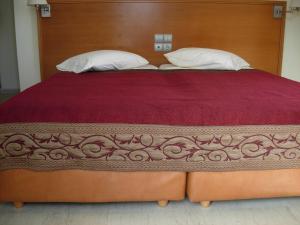 Posteľ alebo postele v izbe v ubytovaní Philippos Studios & Apartments