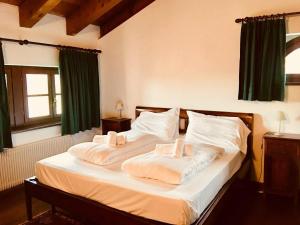 Postel nebo postele na pokoji v ubytování Agriturismo Scacciapensieri