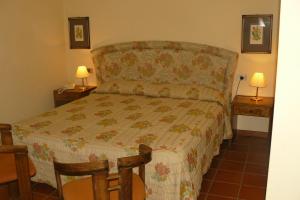 Postel nebo postele na pokoji v ubytování Hotel La Rocca