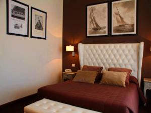 Postel nebo postele na pokoji v ubytování Hotel Ancora Riviera