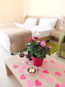 Postel nebo postele na pokoji v ubytování ApartHotel Belvedere Residence Becici Budva