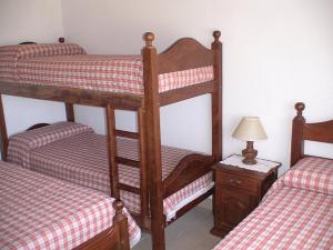 Una cama o camas cuchetas en una habitación  de Juana Pinamar