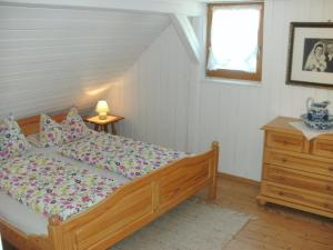 Postel nebo postele na pokoji v ubytování Gasthof Bischofsmühle