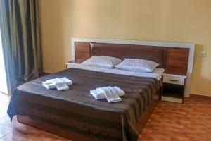 Postel nebo postele na pokoji v ubytování Golden Fleece Hotel