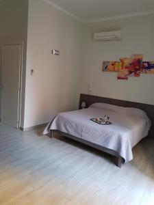 Postel nebo postele na pokoji v ubytování B&b ONE