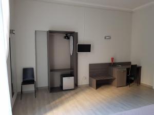 TV a/nebo společenská místnost v ubytování B&b ONE