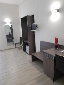 TV a/nebo společenská místnost v ubytování B&b ONE