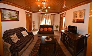 Гостиная зона в Casa Ferreira