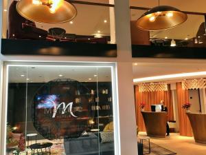 TV a/nebo společenská místnost v ubytování Mercure Hotel Kaiserhof City Center