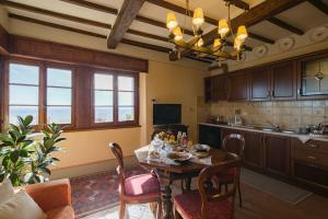 a kitchen with a table with food on it at Panorama in Cortona