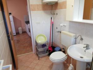 Kúpeľňa v ubytovaní Apartman Ribarić
