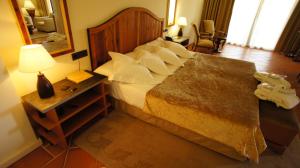 Cama o camas de una habitación en Hotel Cigarral el Bosque